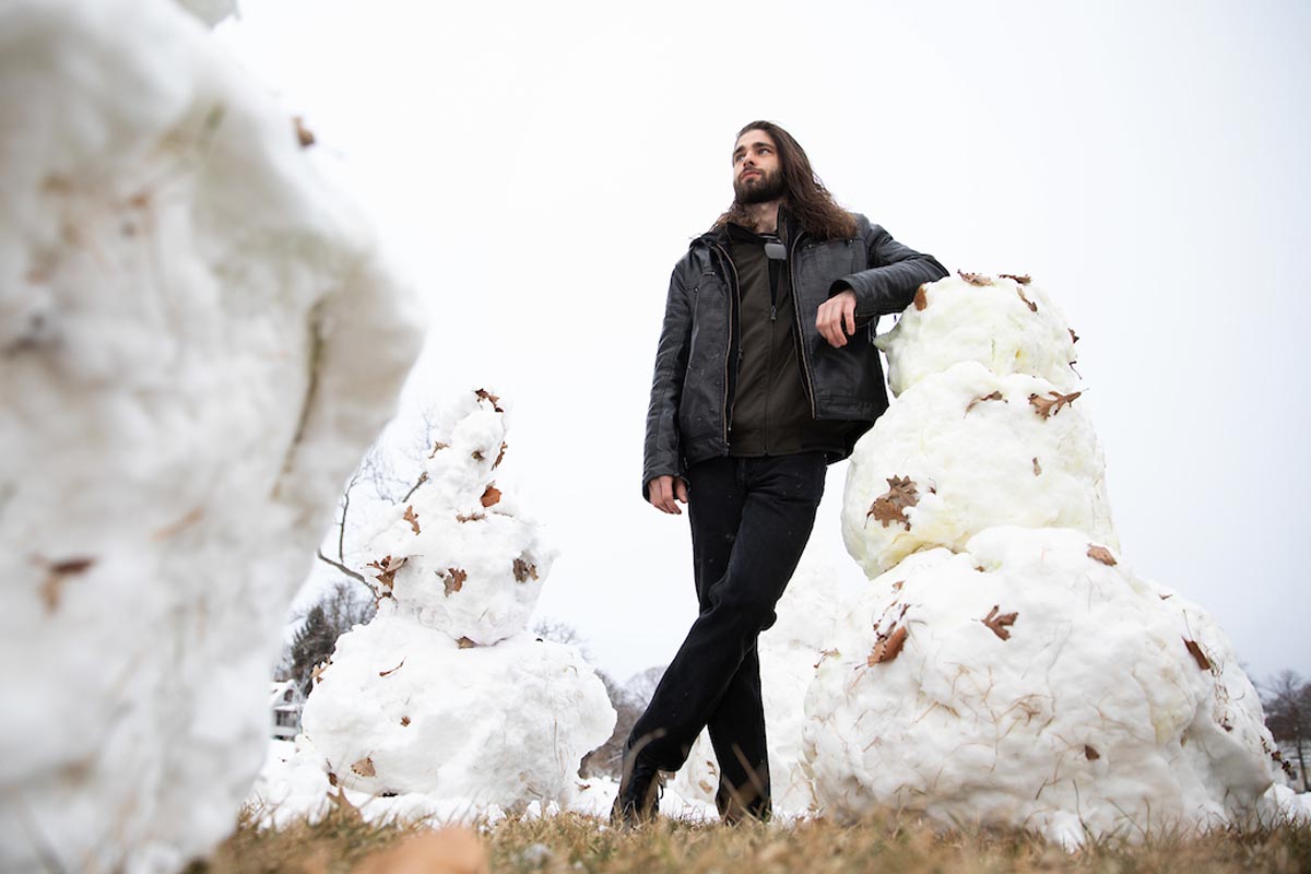 Alec Paul Johnson creates his "Love Army" of snowmen in Leavenworth Park