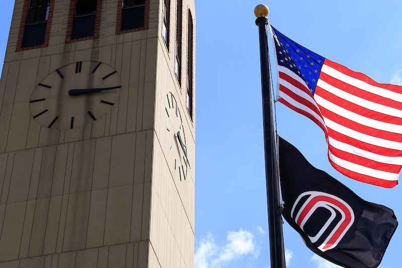 U.S. and UNO Flags flying beside the Campanile