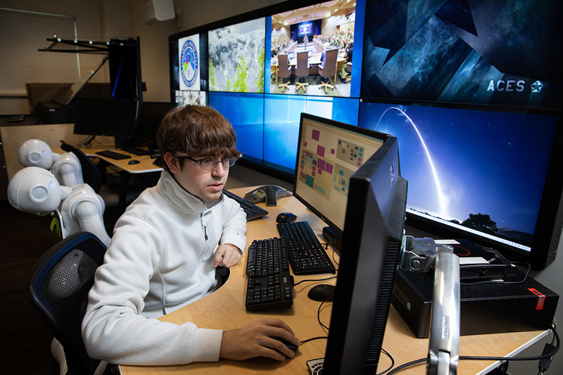 A student works inside the Peter Kiewit Institute on campus