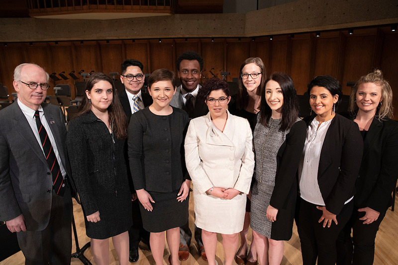 Chancellor Gold poses with the MavForensics team