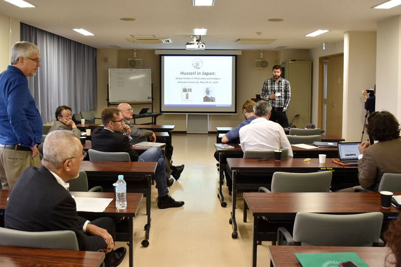 UNO associate professor Curtis Hutt (far left) joins UNO's Mark Celinscak, executive director of UNO's Sam & Frances Fried Holocaust & Genocide Academy at a session during the recent international academic conference on philosopher Edmund Husserl. The event was co-organized by UNO and its sister campus Shizuoka University. 