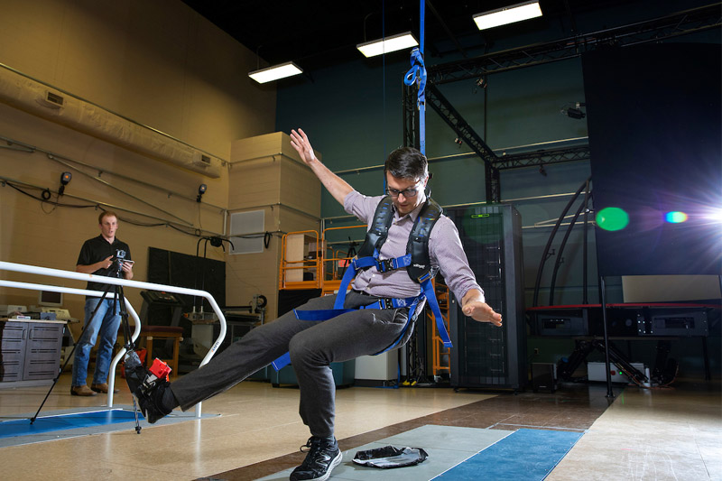 Nate Hunt, Ph.D, demonstrates how he and his team of graduate students can trigger slips to study physical responses.