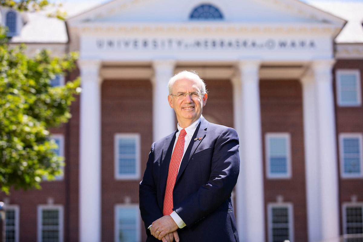 Chancellor Gold poses outside of the Arts & Sciences Hall