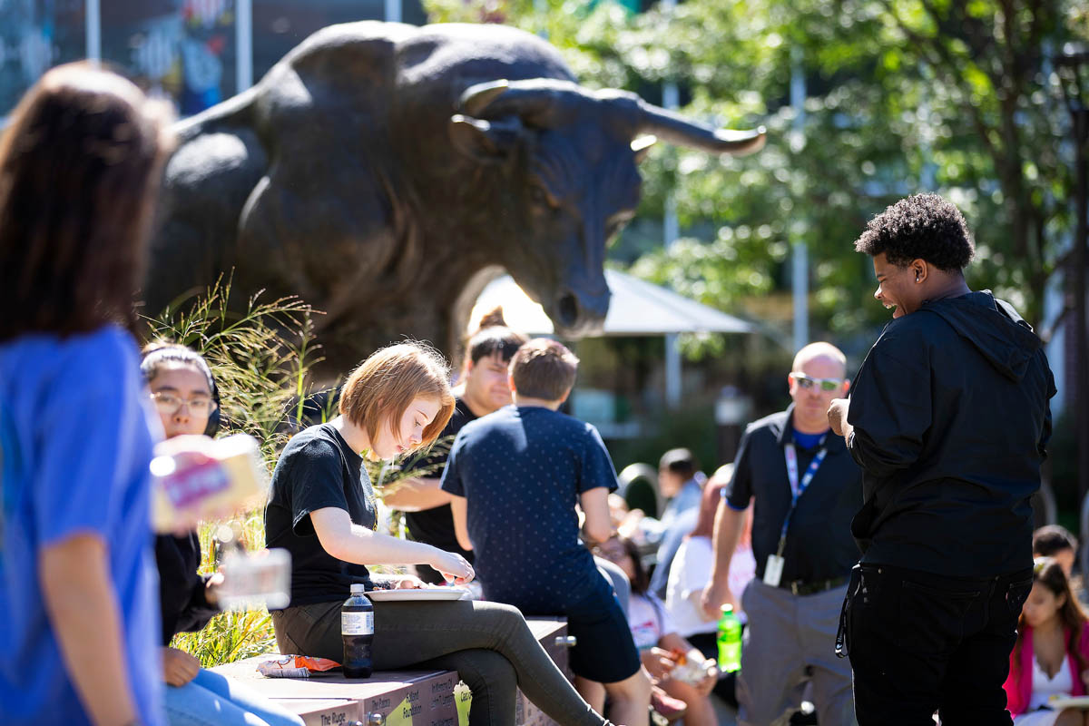 Students gather outside the Health & Kinesiology building during an August Durango Days event.