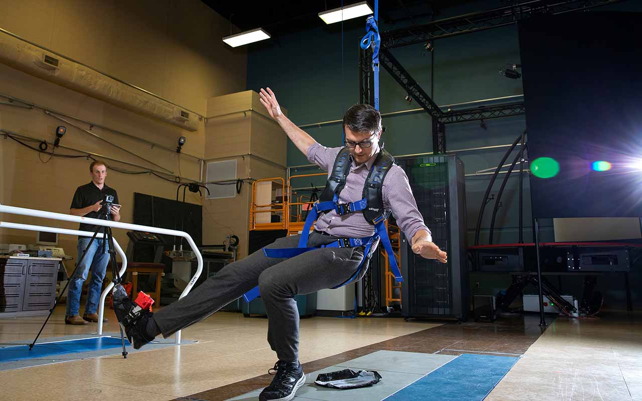 Nate Hunt, Ph.D., assistant professor within UNO's Department of Biomechanics, is leading research into the science behind slips and falls. The study uses a custom-designed shoe that triggers unexpected slips.