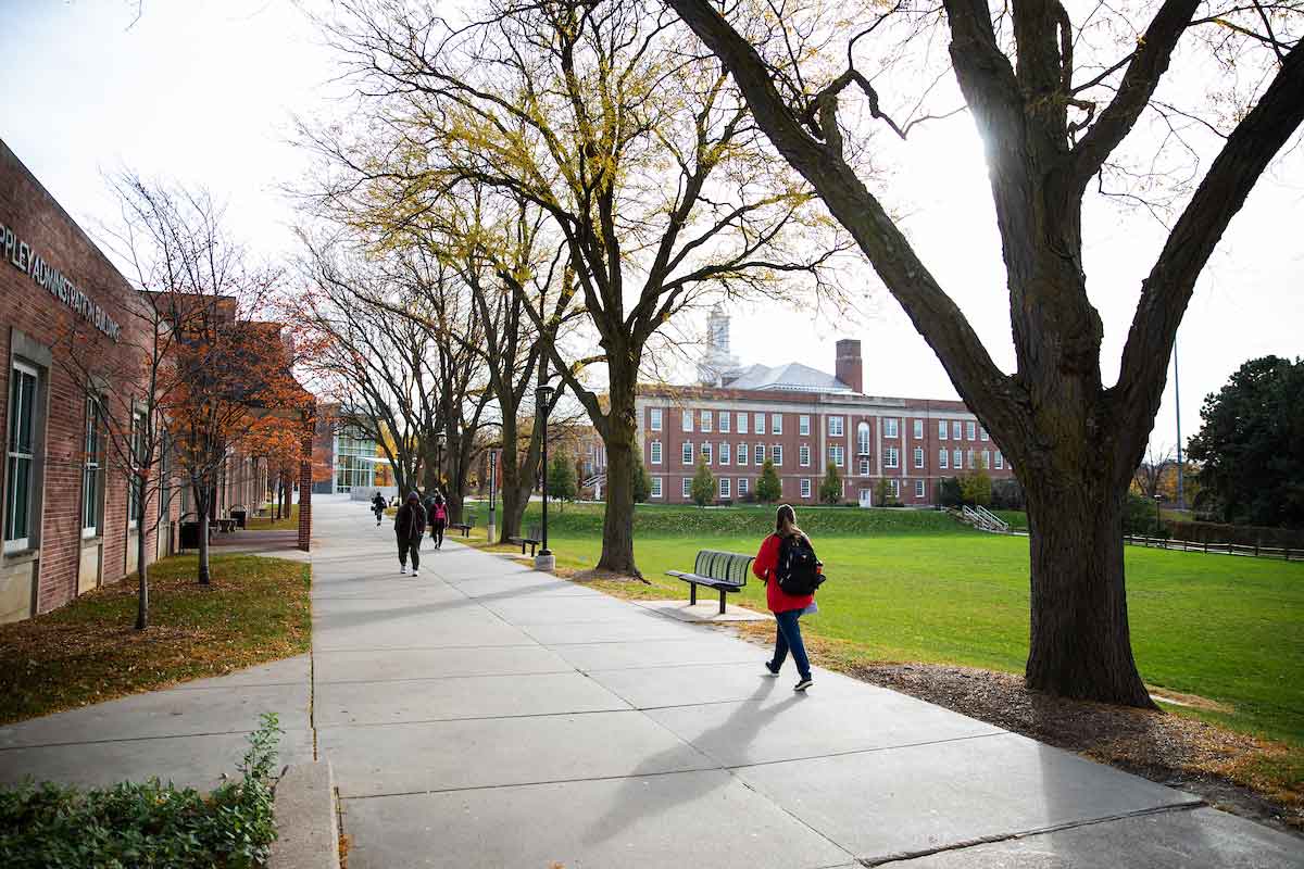 Students walk in front of the Eppley Administration Building in the fall