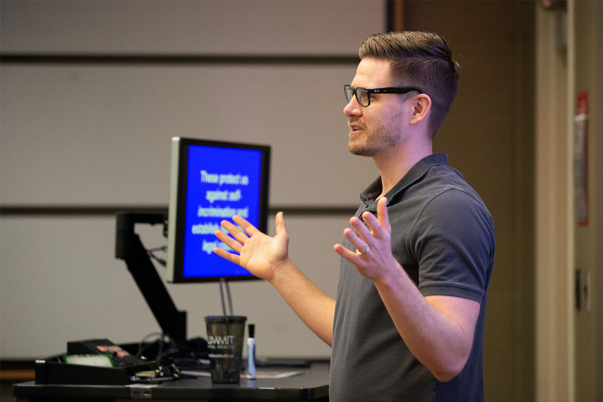 Justin Nix, Ph.D., teaches a class on police and society as part of the School of Criminology and Criminal Justice in the College of Public Affairs and Community Service.
