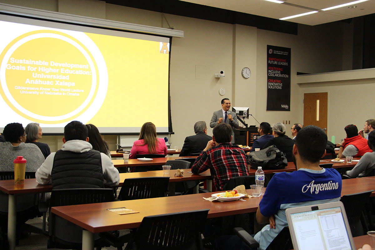 Participants listen to a presentation on Xalapa