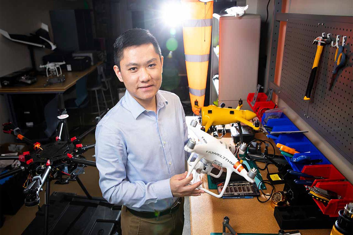 Chenyu "Victor" Huang, Ph.D., an assistant professor in the UNO Aviation Institute, teaches about unmanned aircraft in the College of Public Affairs and Community Service Building at the University of Nebraska at Omaha.