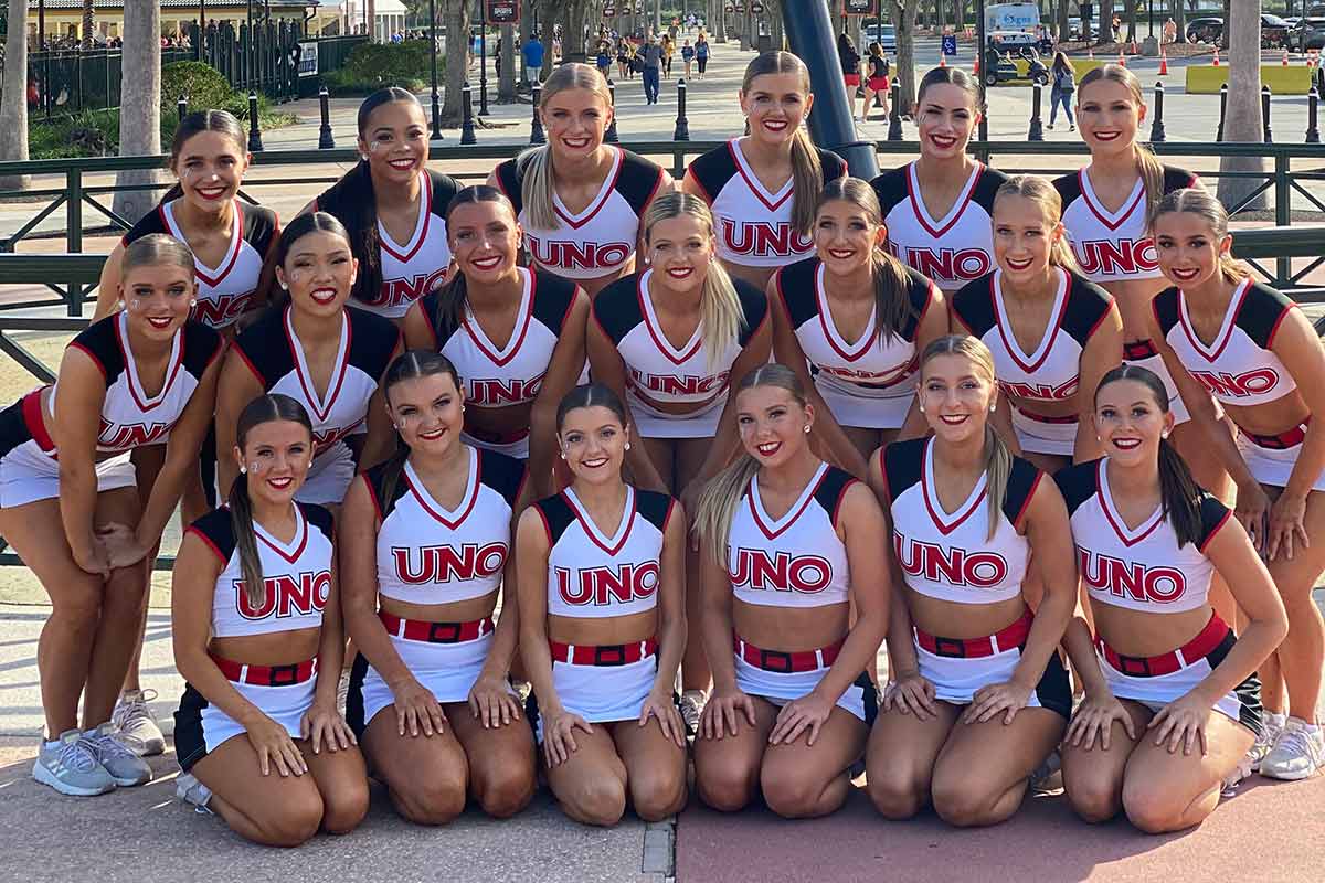 The UNO Dance Team poses for a picture in Orlando