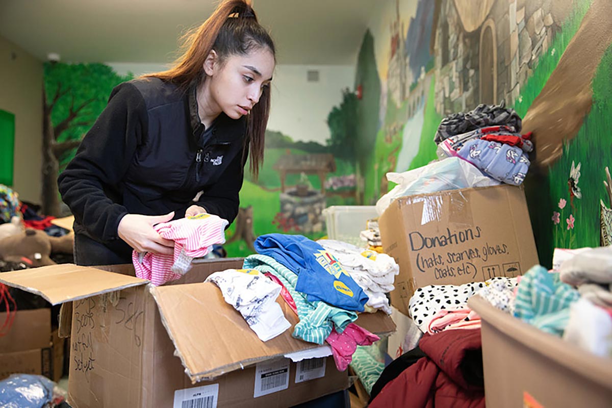 A student volunteers for MLK Day of Service