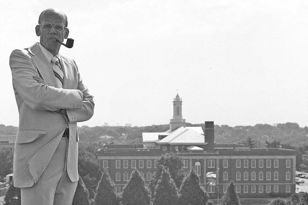 An archival photo of Ron Roskens, former UNO Chancellor, looking out over the UNO campus.