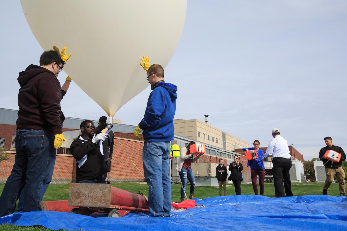 Students prepare to launch a high-altitude balloon