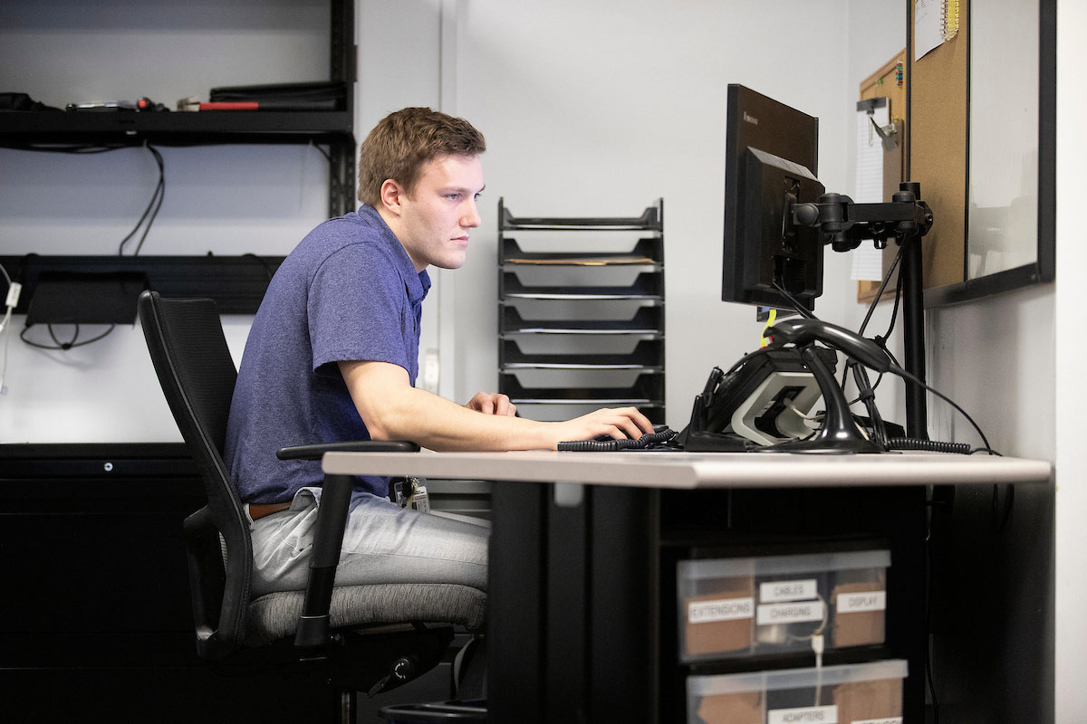 Someone working on a computer