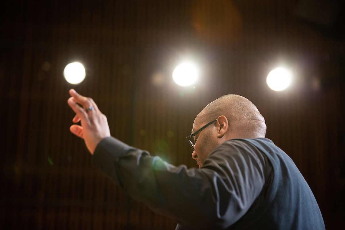 Derrick Fox leads a choir performance at UNO.