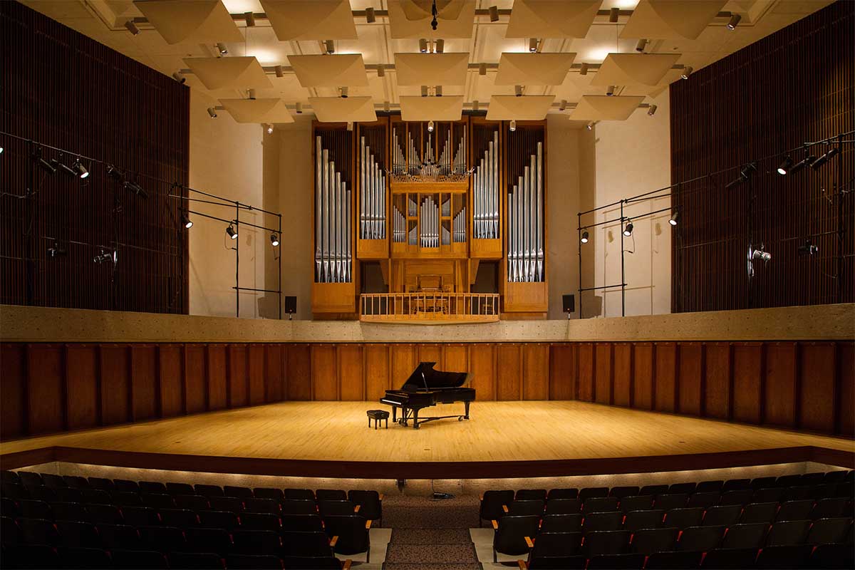 A piano sits on-stage at the Concert Hall within the Strauss Performing Arts Center at the University of Nebraska at Omaha