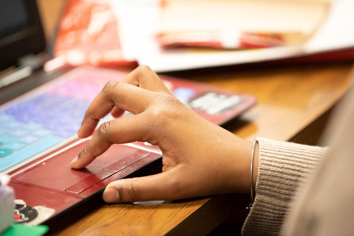 A UNO student uses her laptop.