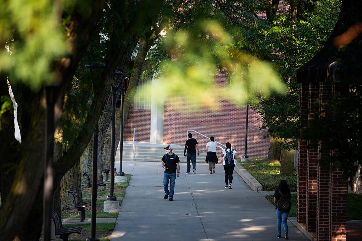 student studying on campus