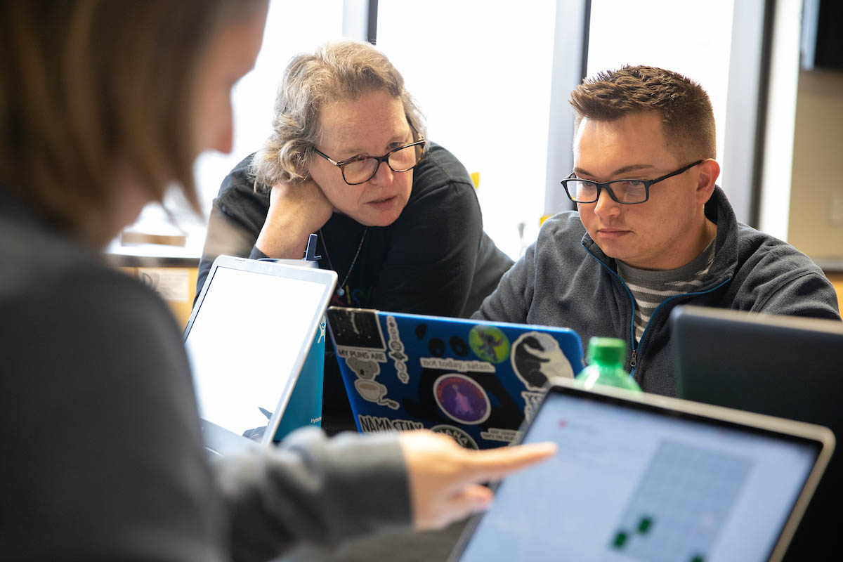 Betty Love, Ph.D., professor of mathematics, works with students during a lesson to her Introduction to Mathematical and Computational Thinking course, which was developed as a new mathematics general education course through NSF funding in 2018. Now, Love and a team of faculty are poised to innovate within general education math curriculum once again.