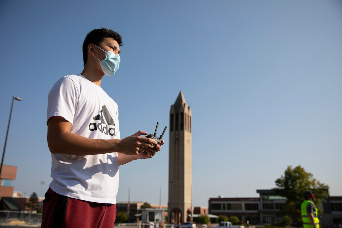 UNO Aviation Institute students John Koch, left, and Jason Chan record photos and video with a drone over campus at the University of Nebraska at Omaha