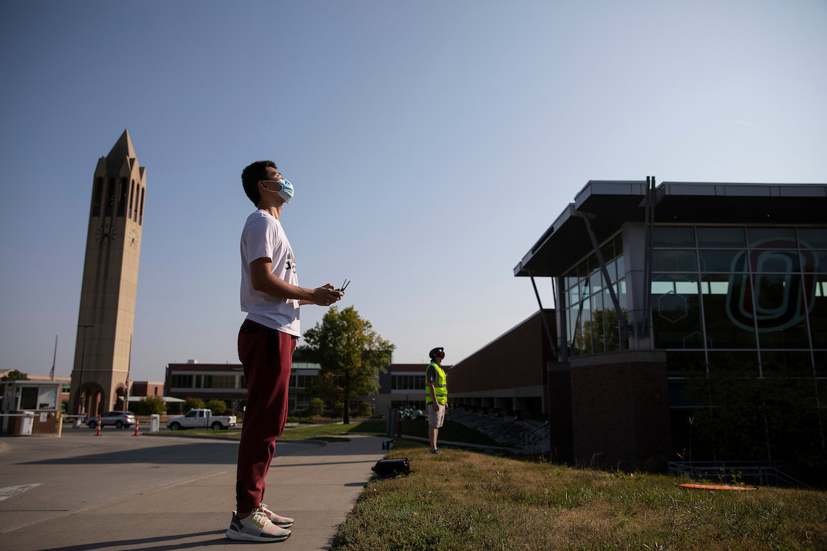 UNO Aviation Institute students John Koch, left, and Jason Chan record photos and video with a drone over campus at the University of Nebraska at Omaha