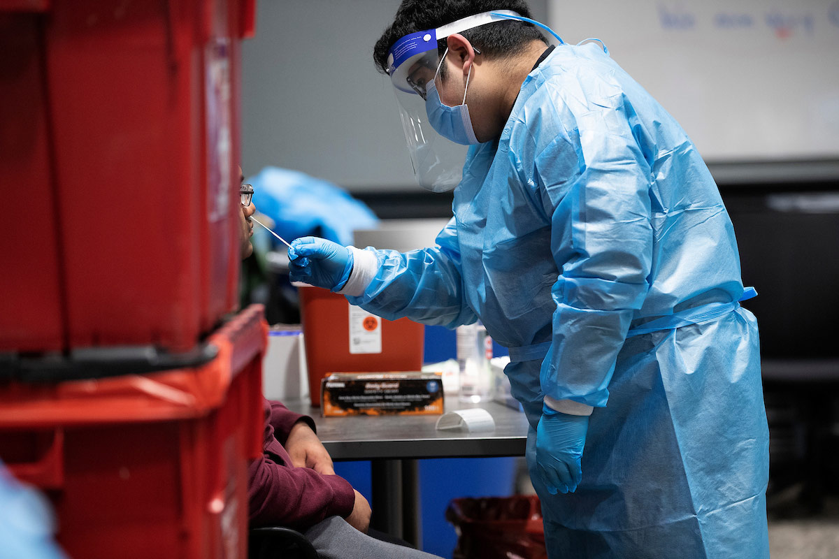 student workers assist in testing others for COVID-19 (coronavirus) at the UNO Testing Center