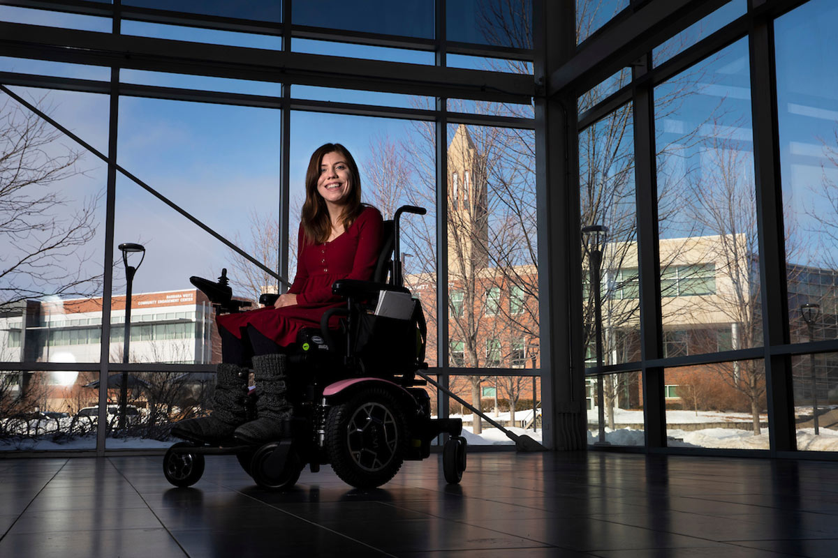 Brittany Kohl sits inside the Health and Kinesiology building