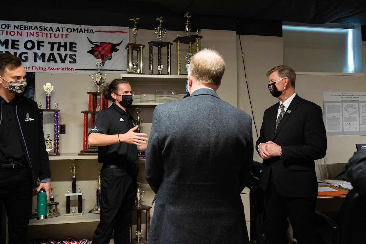 Carter talking with institute students