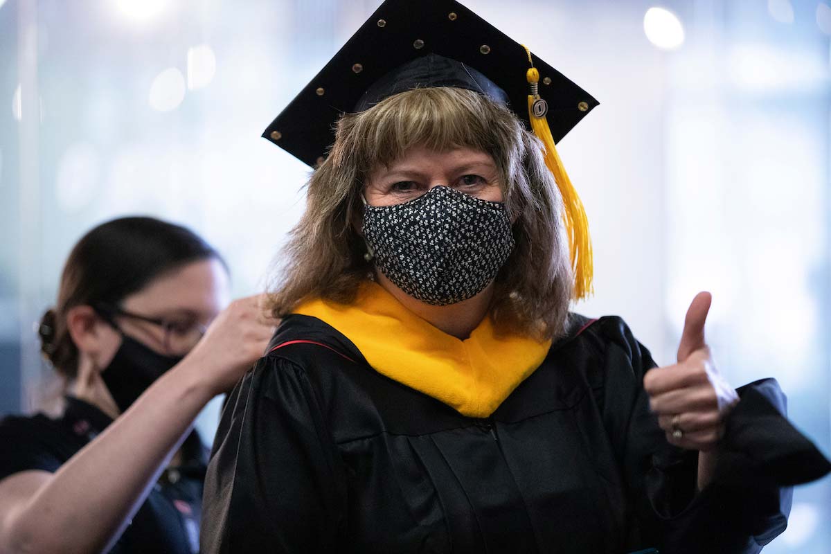 A student graduates at UNO's May 2021 commencement ceremonies.