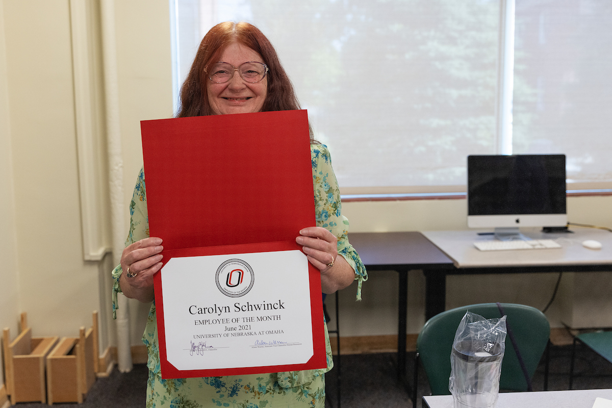 Carolyn Schwink receives the June 2021 UNO Employee of the Month recognition.