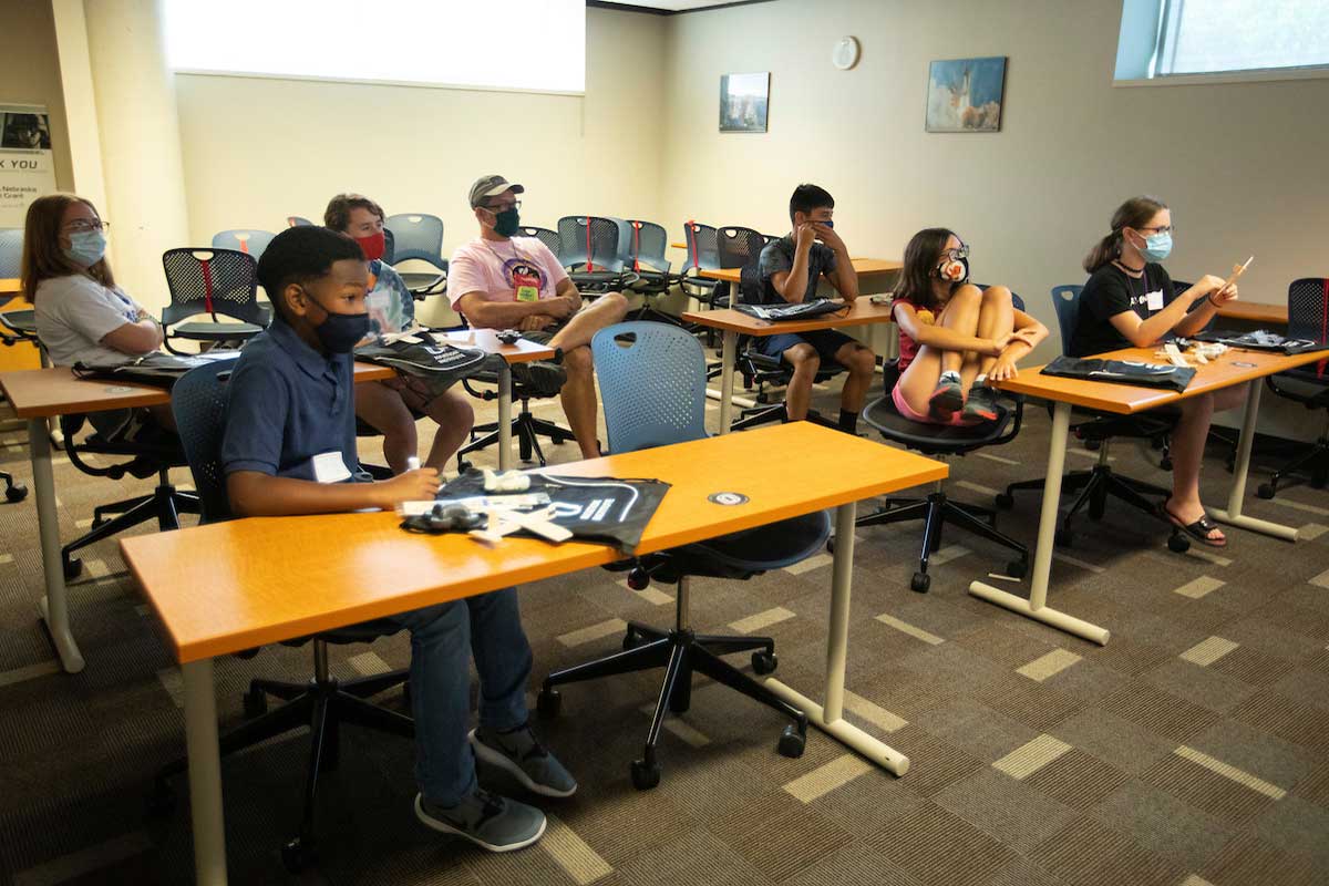 Students listen to an Aviation lecture at AIm for the Stars