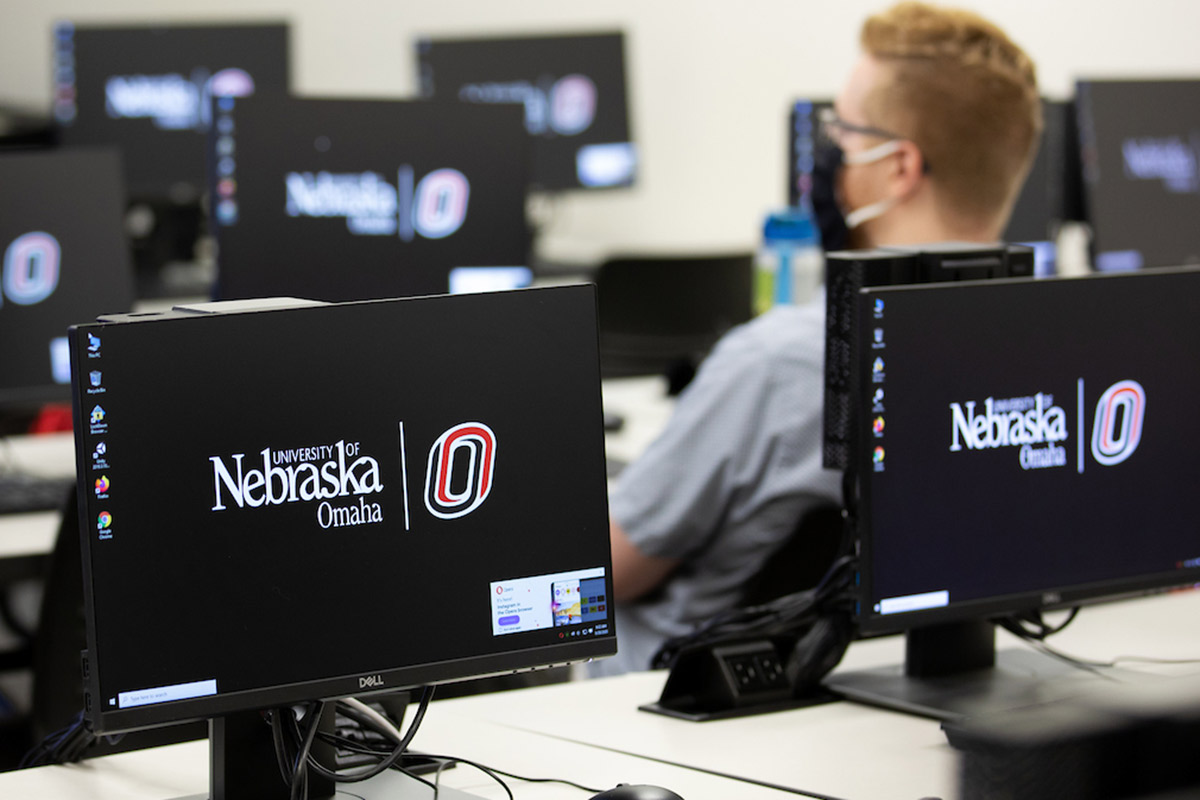 computers in classroom with UNO logo