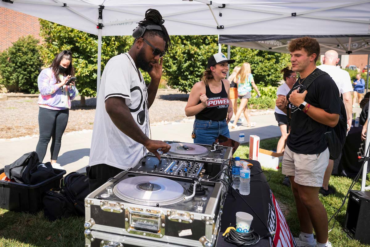 Who says you can't come home? UNO alum Alyssa and Mr. West from Power 106.9 entertained Mavericks with live mixing and giveaways.