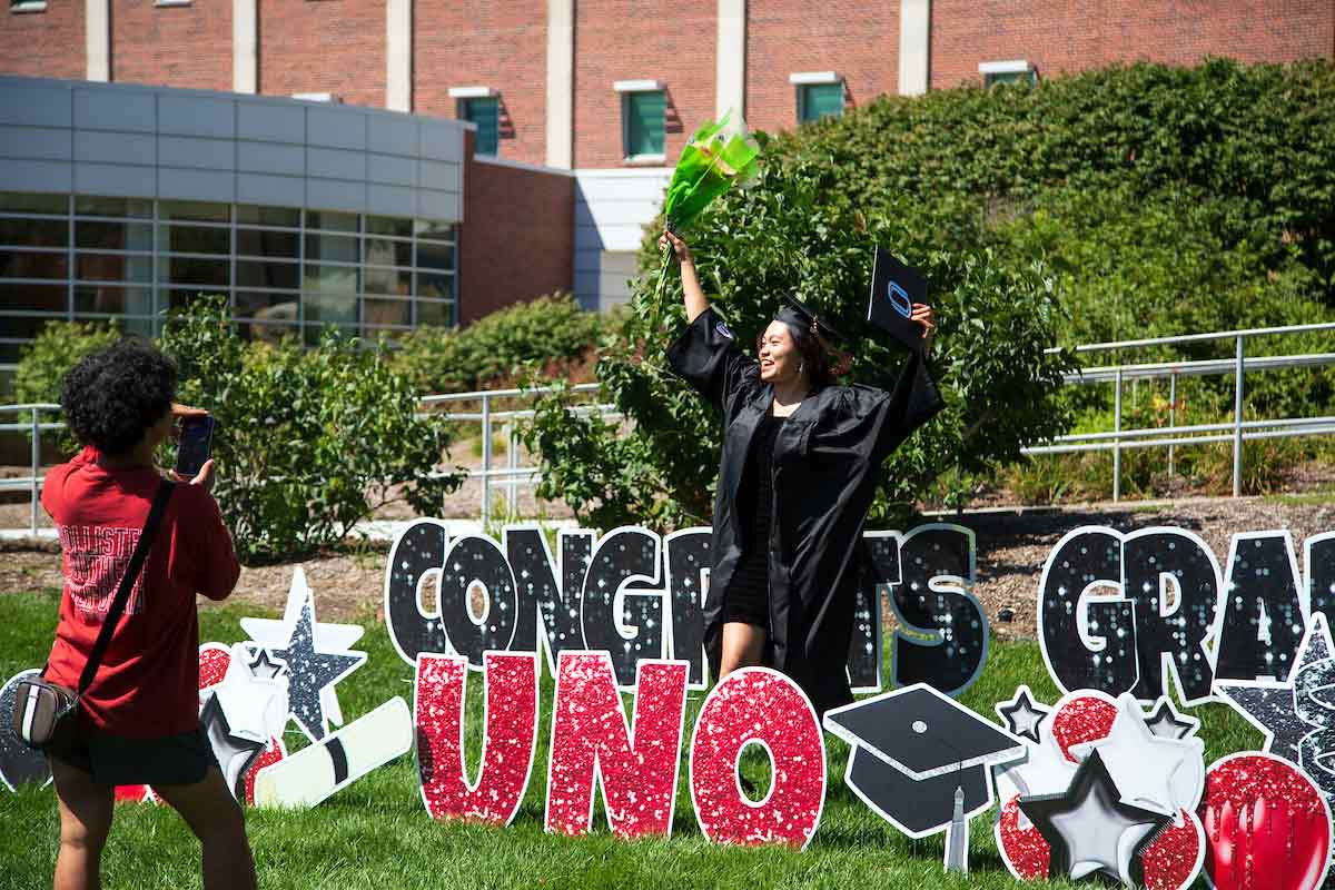 A student celebrates on Dodge Campus