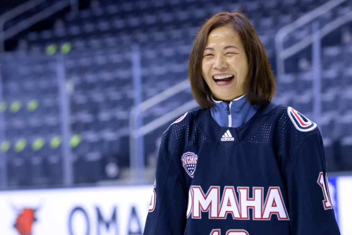 Chancellor Li in a Mavericks hockey jersey