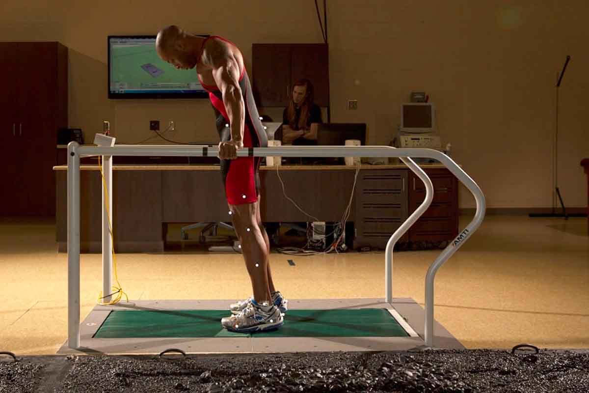 A test subject is recording his gait in one of UNO's biomechanics lab spaces.