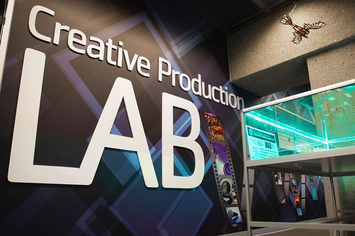 Creative Production Lab sign with figures