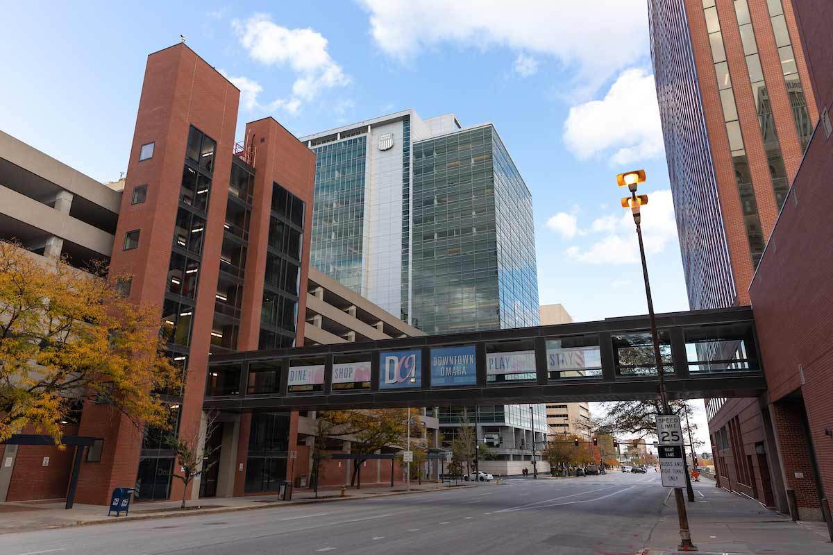 A photo of the Omaha skyline from the street in Downtown Omaha, looking up at the Union Pacific Headquarters building