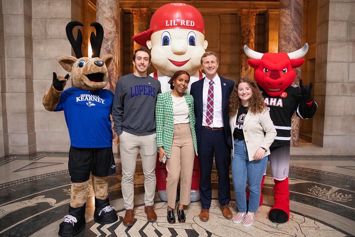 Student Regents and mascots from the University of Nebraska System (NU) pose for a photo at "I Love NU" Day at the Nebraska State Capitol.
