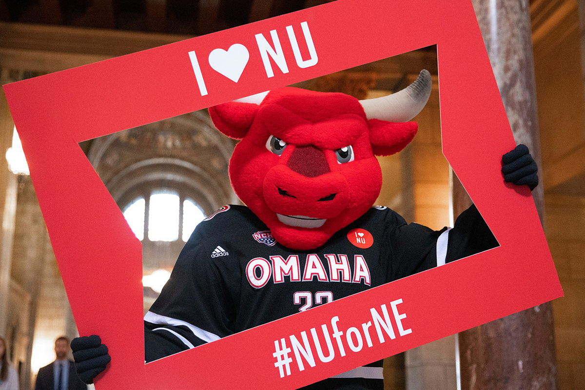 Durango enjoying his visit to the Nebraska State Capitol for "I Love NU" Day.