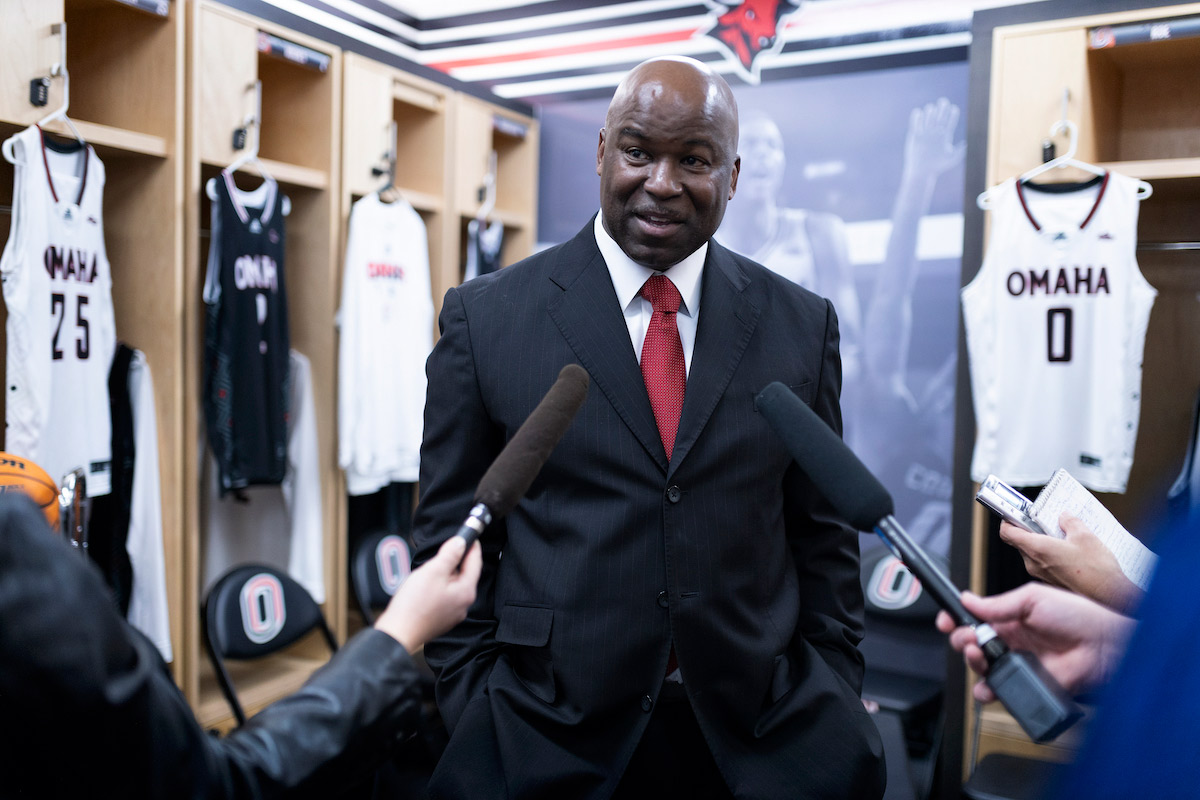 Omaha men's basketball coach Chris Crutchfield speaks to media.