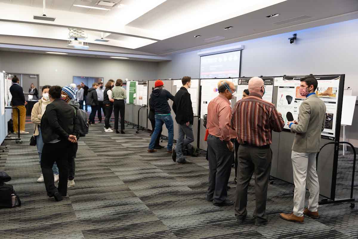 A wide shot of multiple presenters at the RCAF