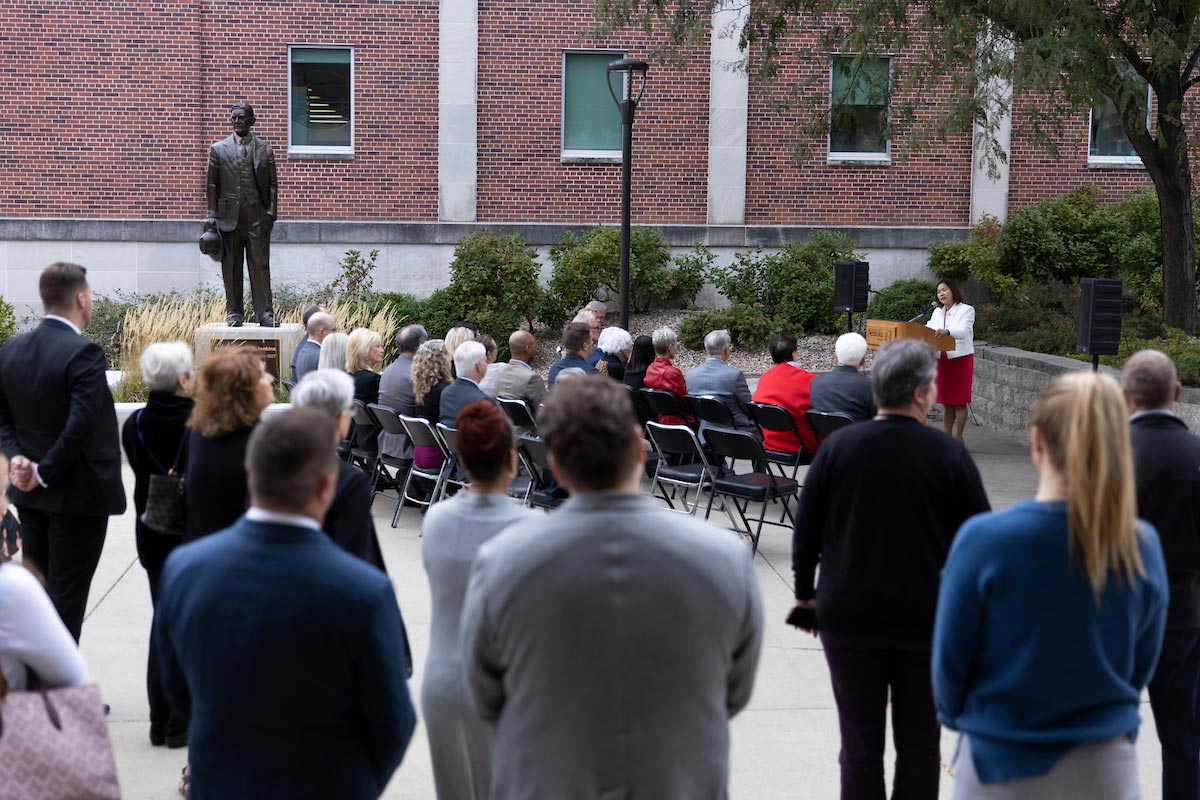 Chancellor Joanne Li gives remarks during the dedication.