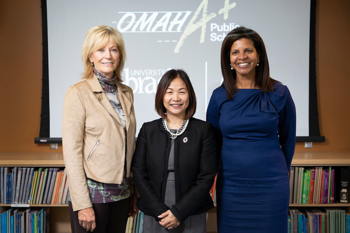 From left: UNO College of Education, Health, and Human Sciences Dean Nancy Edick, Ph.D; UNO Chancellor Joanne Li, Ph.D., CFA; and Omaha Public Schools Superintendent Cheryl Logan, Ed.D.