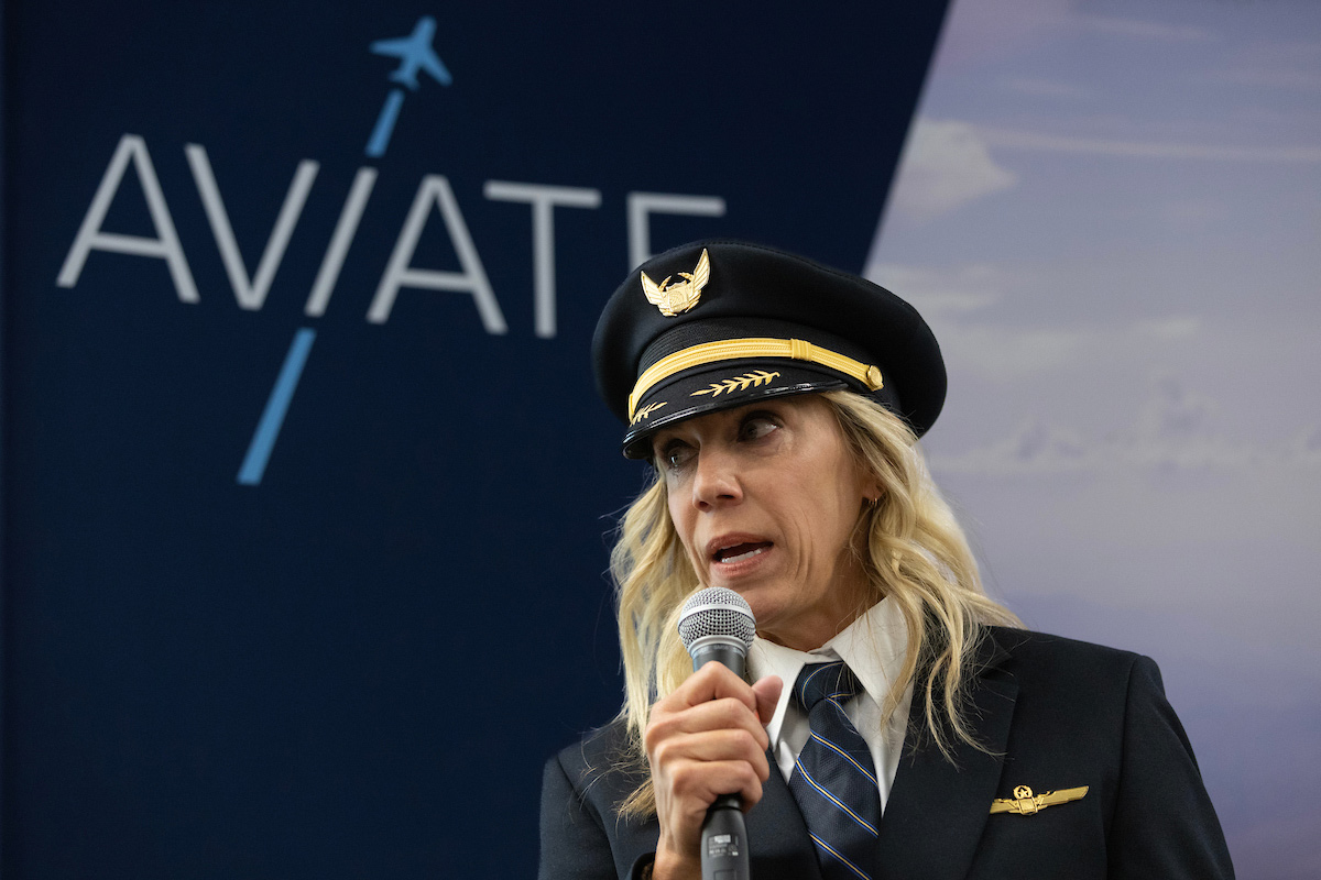 United Airlines pilot Monica Frain speaks at the ribbon cutting ceremony celebrating UNO's new partnership with United Airlines.