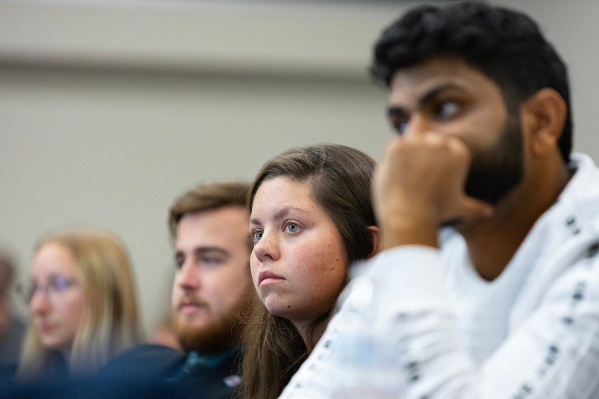 Students interested in aviation attend the ribbon cutting ceremony celebrating UNO's new partnership with United Airlines.