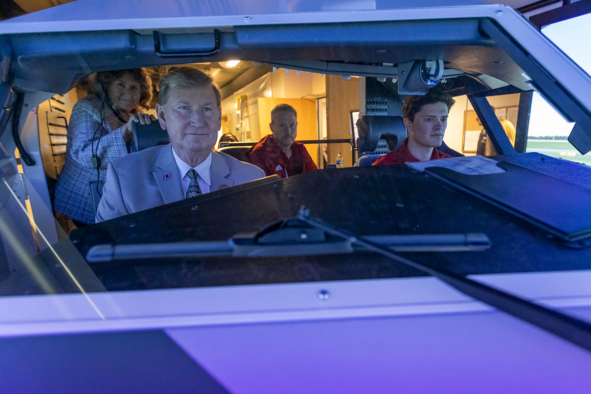 University of Nebraska System (NU) President Ted Carter in the cockpit of UNO's new Boeing 737 Flight Training Device from Flightdeck Solutions