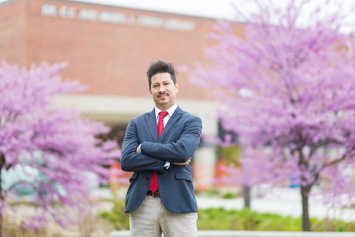 Felipe Blanco, Ph.D. in front of the Dr. C.C. and Mabel L. Criss Library