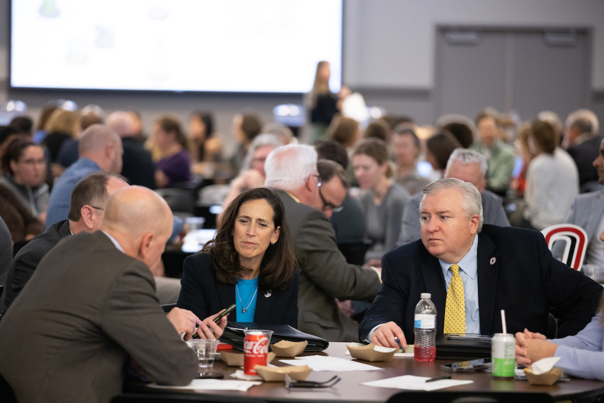 Attendees talking during a brainstorming session