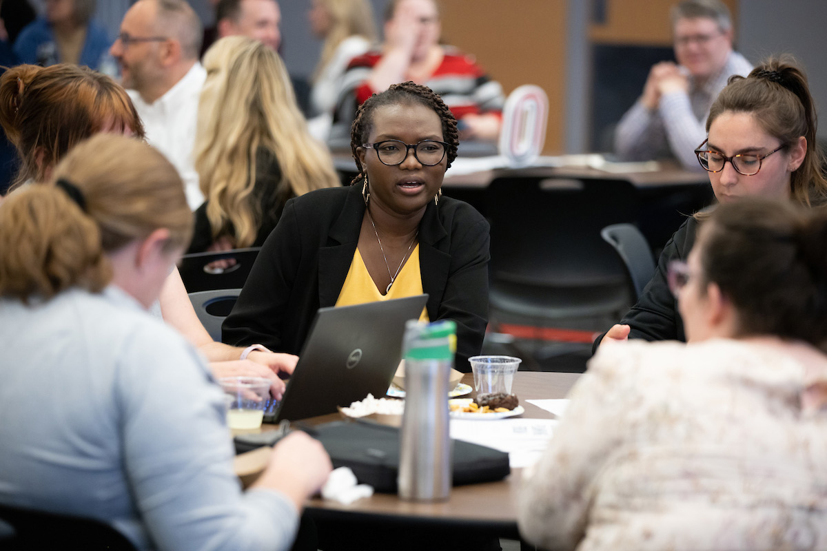 Attendees talking during a brainstorming session